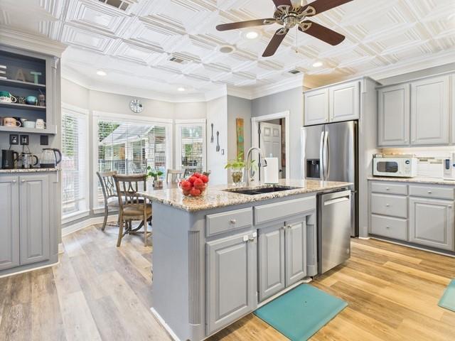 1101 Bunny Rabbit Road Athens, TX 75751 - Photo 14 of 40 a kitchen with granite countertop a sink appliances cabinets and furniture