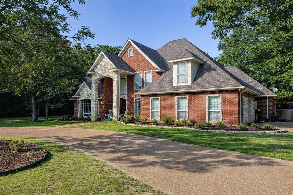 1101 Bunny Rabbit Road Athens, TX 75751 - Photo 2 of 40 a front view of a house with a yard