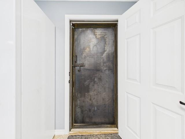 1101 Bunny Rabbit Road Athens, TX 75751 - Photo 27 of 40 a bathroom with a glass shower door