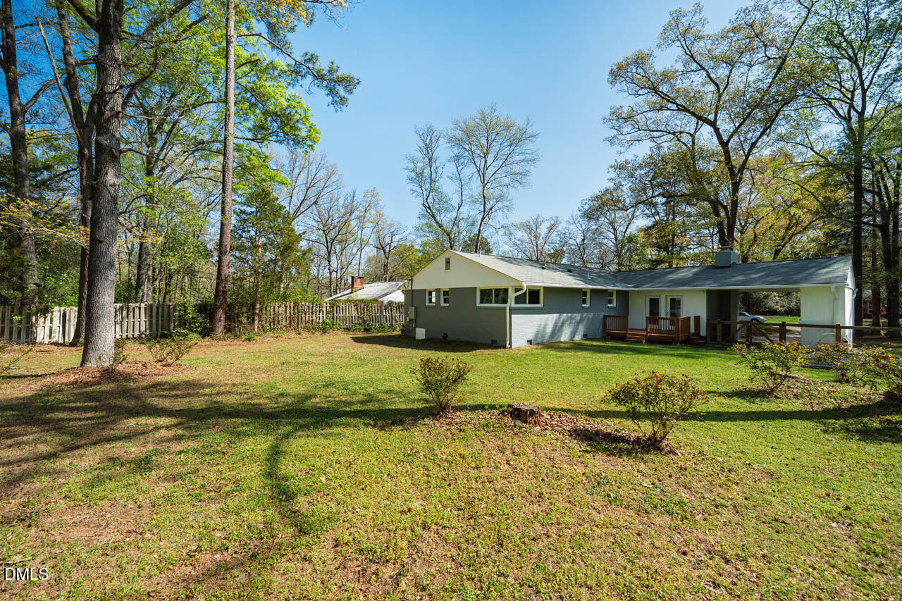 231 Flemington Road Chapel Hill, NC 27517 - Photo 33 of 48 a front view of a house with a yard
