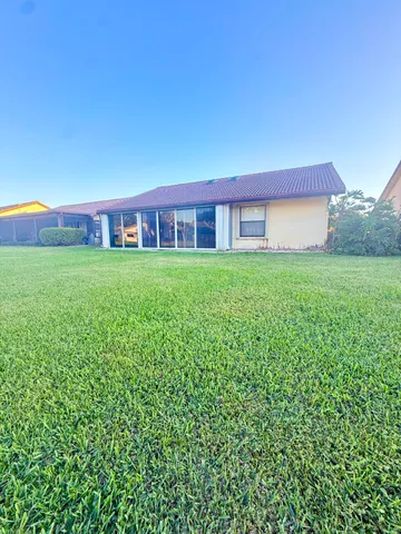 a view of outdoor space and yard