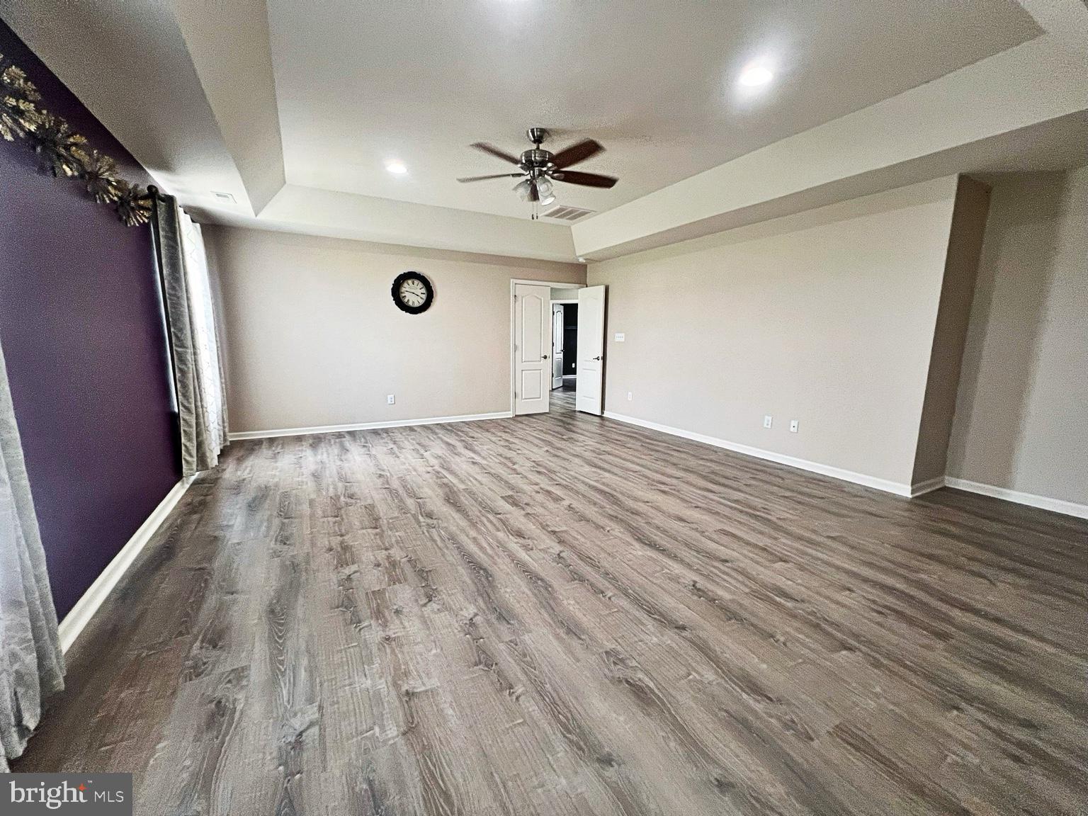 1147 Cardigan Road Middletown, DE 19709 - Photo 17 of 32 a view of empty room with wooden floor