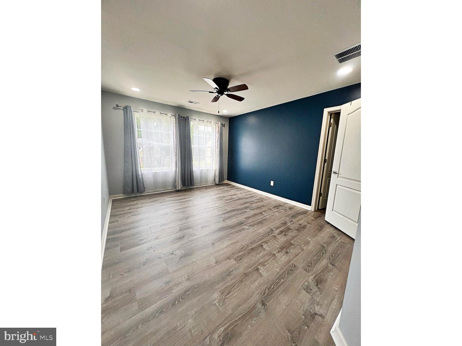 1147 Cardigan Road Middletown, DE 19709 - Photo 24 of 32 a view of a livingroom with a ceiling fan and window
