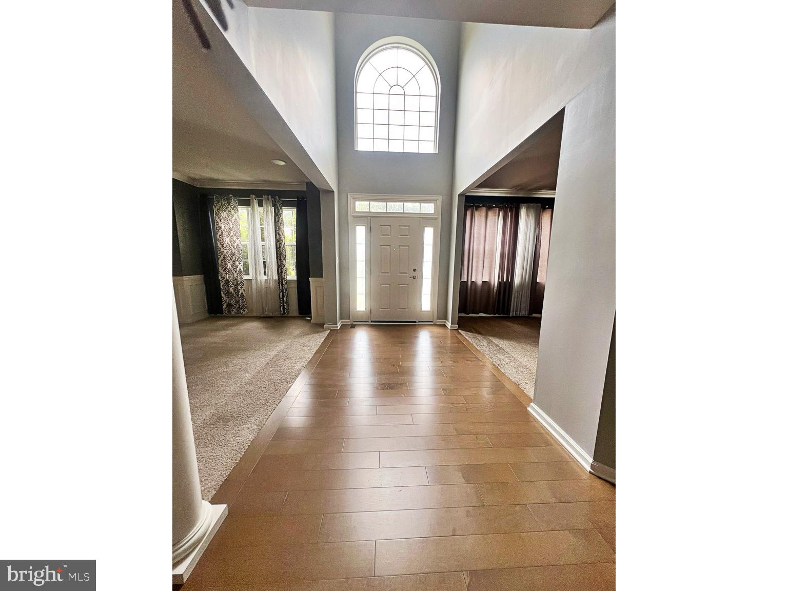 1147 Cardigan Road Middletown, DE 19709 - Photo 5 of 32 a view of a hallway with entryway and a window