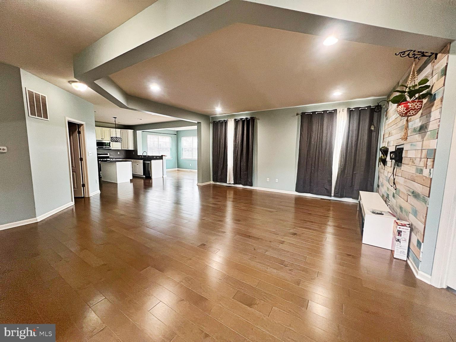 1147 Cardigan Road Middletown, DE 19709 - Photo 7 of 32 a view of empty room with wooden floor