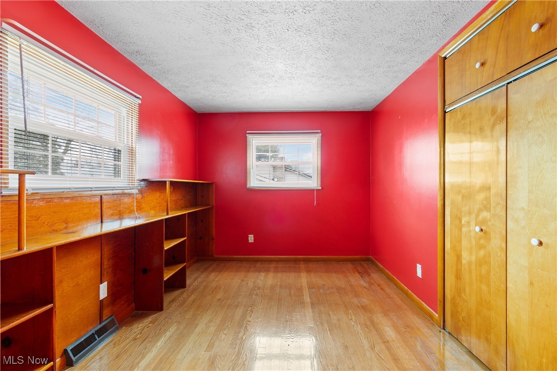 241 Baker Street Rittman, OH 44270 - Photo 11 of 25 Unfurnished office with a textured ceiling and light wood-type flooring