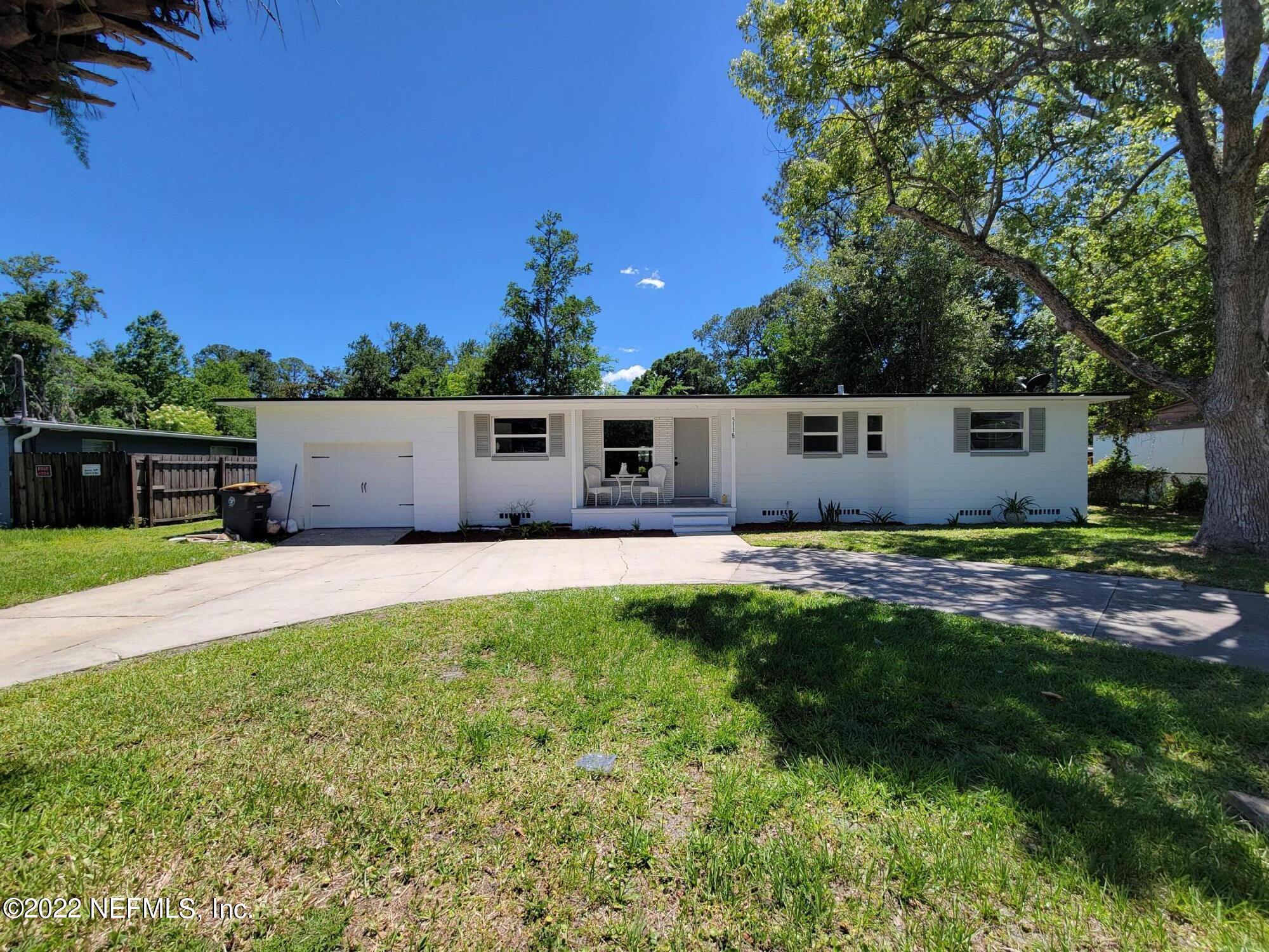 5118 Spring Glen Road Jacksonville, FL 32207 - Photo 3 of 33 a house view with a garden space