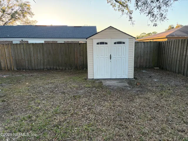 a view of backyard of house