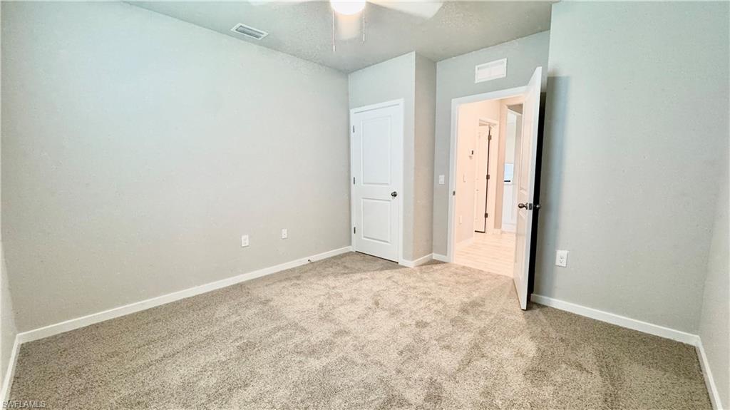 17710 Shade Tree Loop Babcock Ranch, FL 33982 - Photo 21 of 28 a view of an empty room