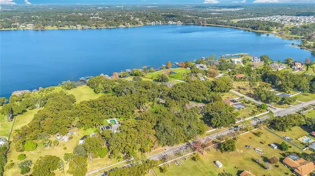 view of a lake with mountain in the background