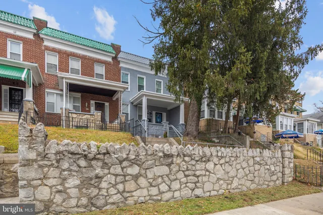 a front view of a house with swimming pool