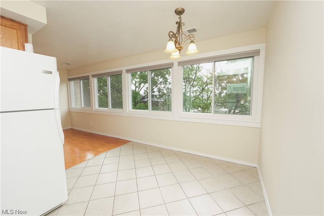 6640 Pearl Road, Unit 509 Cleveland, OH 44130 - Photo 9 of 20 Dining area featuring light tile floors