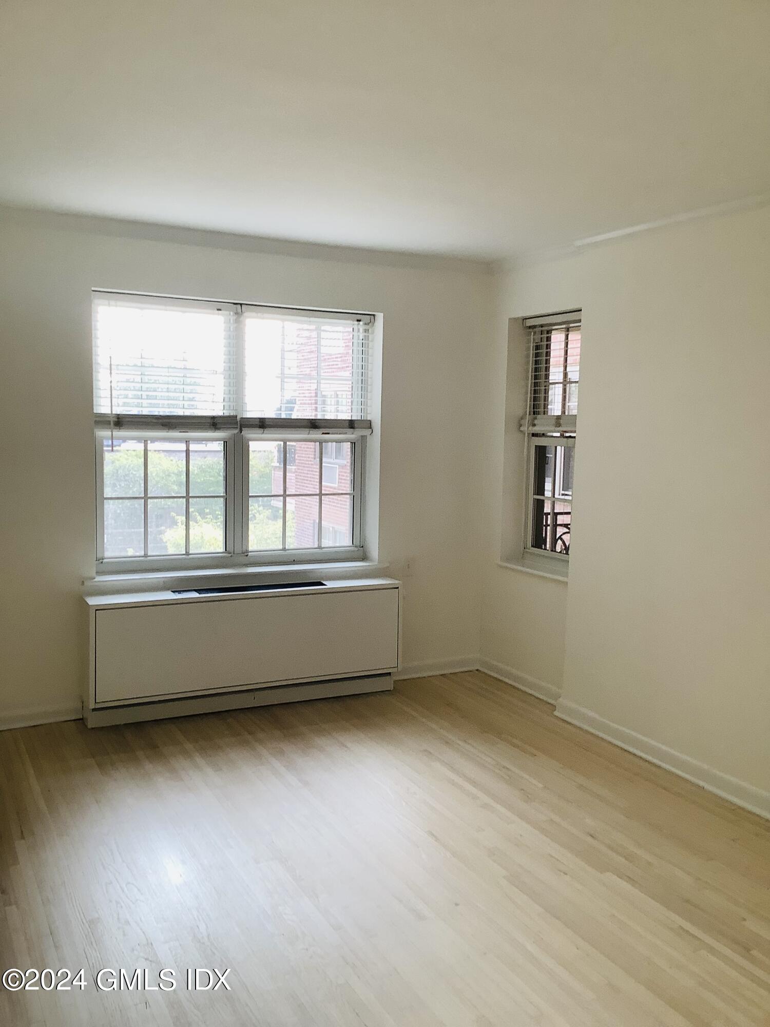 20 Church Street, Unit A26 Greenwich, CT 06830 - Photo 12 of 13 an empty room with a window