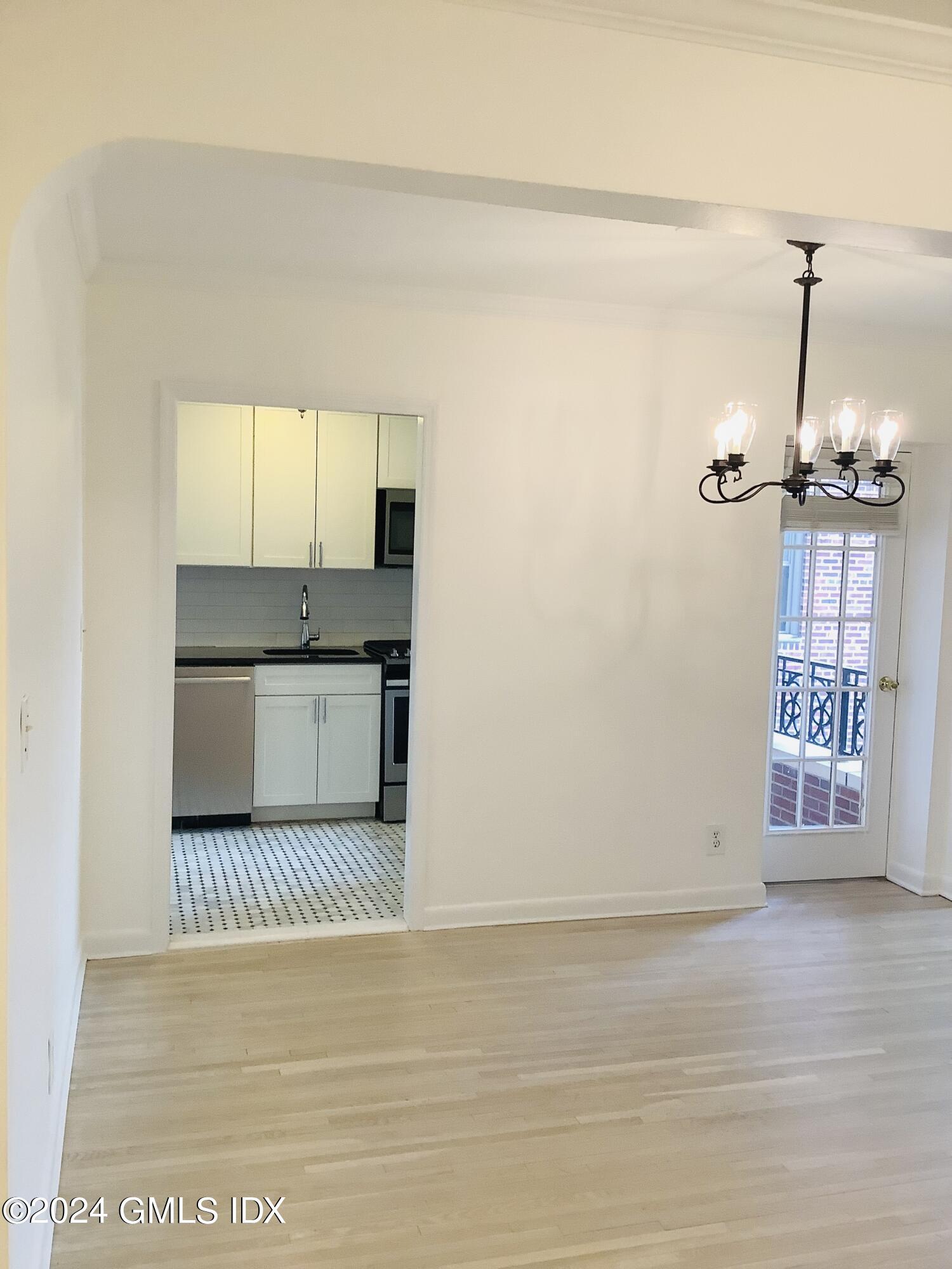20 Church Street, Unit A26 Greenwich, CT 06830 - Photo 7 of 13 a view of a kitchen with a sink