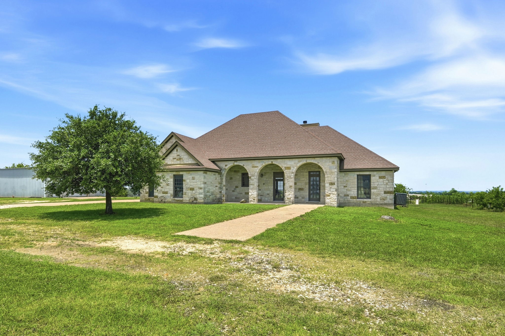 701 County Road 107 Georgetown, TX 78626 - Photo 4 of 30 a front view of a house with a yard