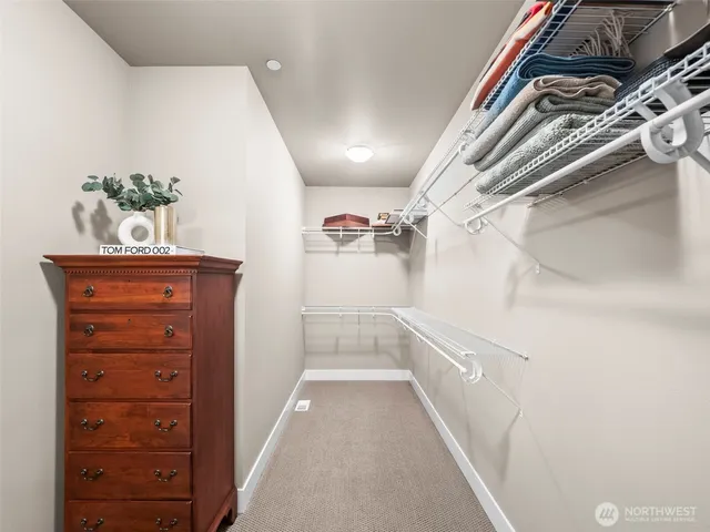 a view of a hallway with a furniture