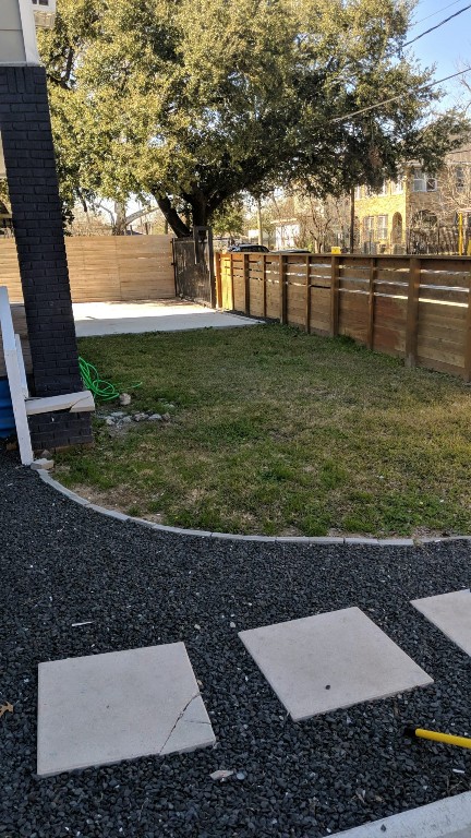 7124 Avenue F, Unit 1 Houston, TX 77011 - Photo 9 of 12 a view of a yard with an outdoor seating