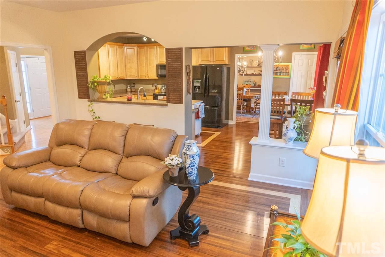 106 Braid Court Raleigh, NC 27603 - Photo 13 of 30 a living room with furniture and a large window