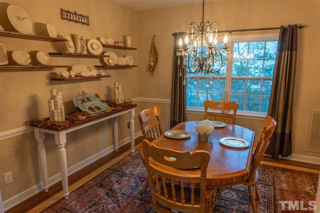 106 Braid Court Raleigh, NC 27603 - Photo 14 of 30 a table and chairs in a room