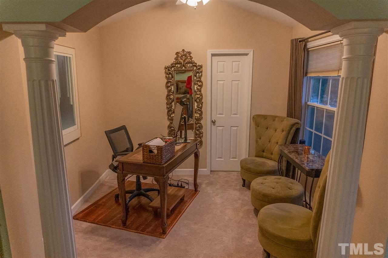 106 Braid Court Raleigh, NC 27603 - Photo 20 of 30 a living room with furniture and a window