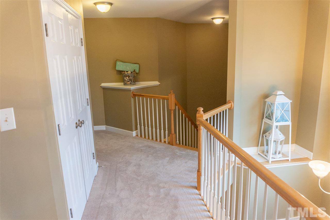 106 Braid Court Raleigh, NC 27603 - Photo 25 of 30 a view of a hallway view with staircase