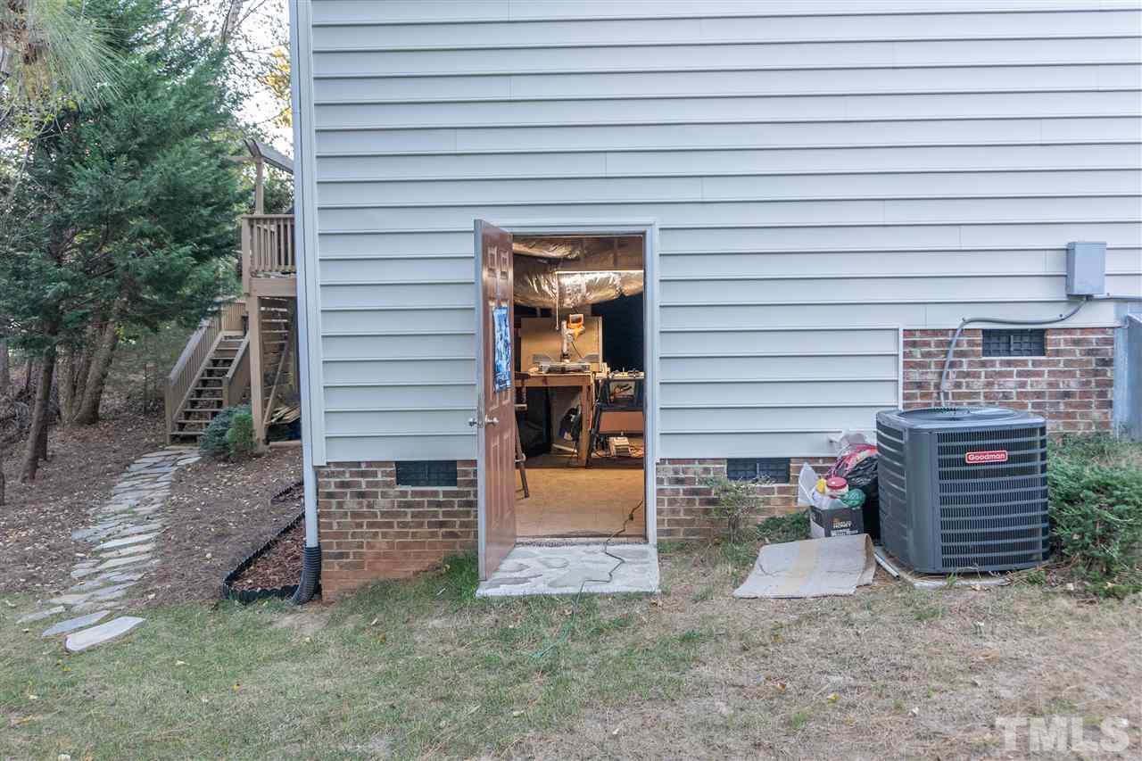 106 Braid Court Raleigh, NC 27603 - Photo 28 of 30 a view of a house with brick walls