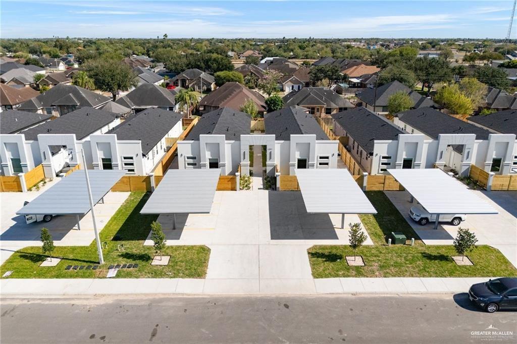 1801 Monaco Drive, Unit 2 San Juan, TX 78589 - Photo 15 of 17 an aerial view of a house with a garden