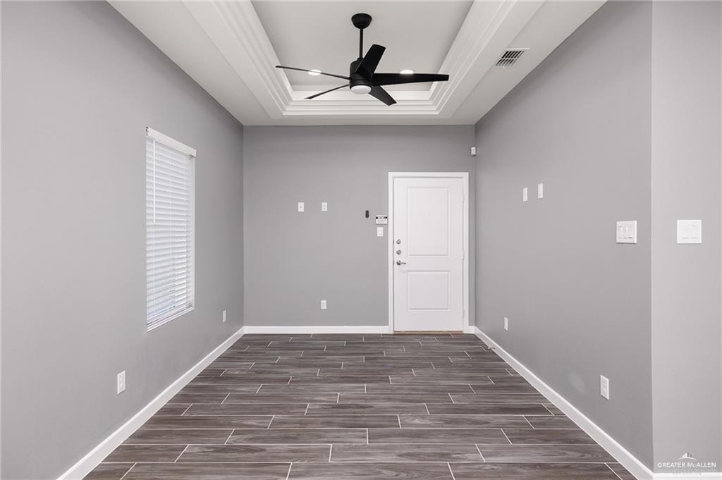 1801 Monaco Drive, Unit 2 San Juan, TX 78589 - Photo 7 of 17 a view of an empty room and window