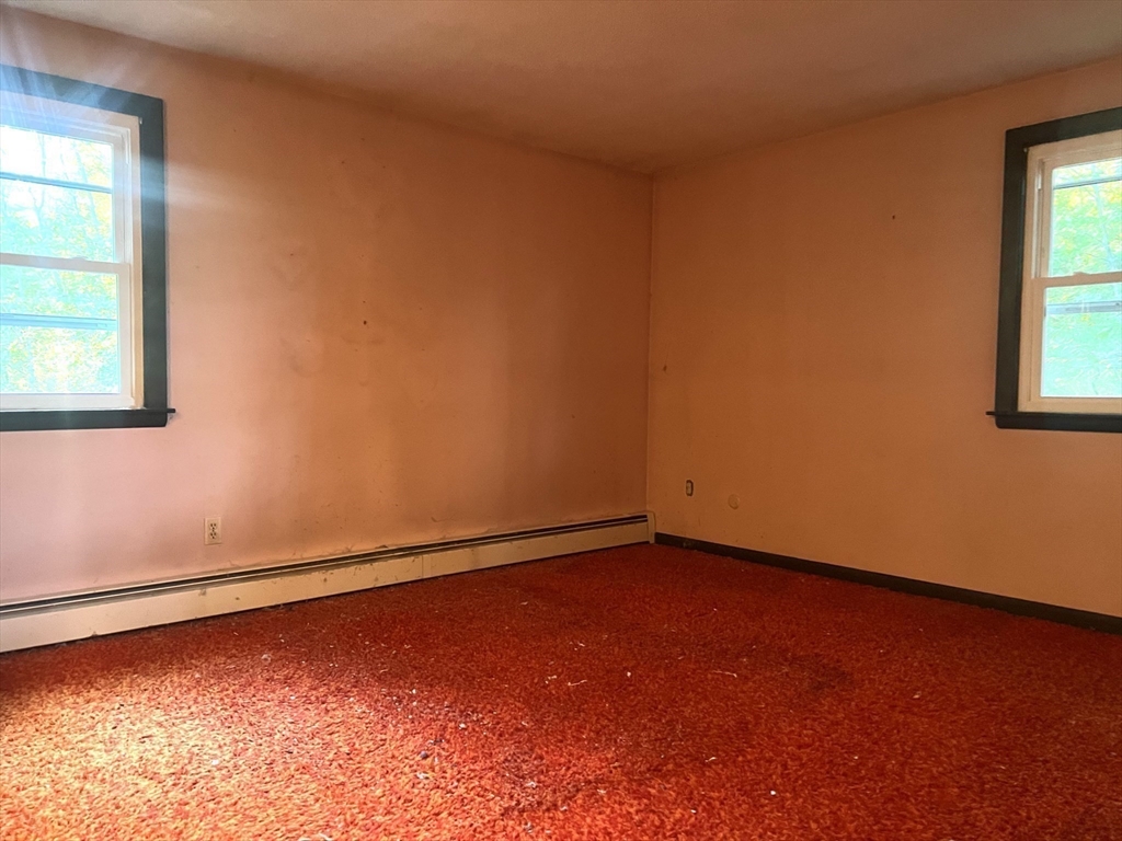 831 Providence Road Northbridge, MA 01588 - Photo 12 of 40 an empty room with a window
