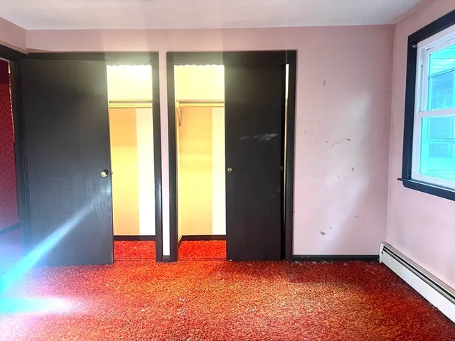 an empty room with window