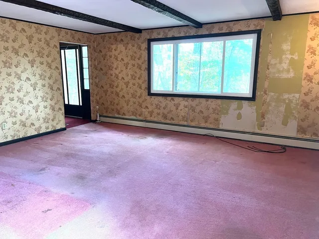 an empty room with a window