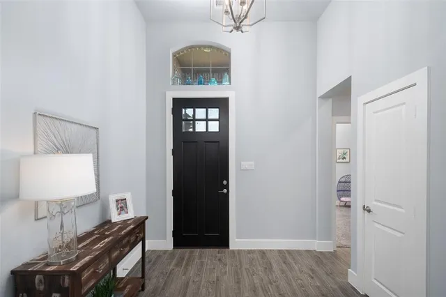 a utility room with sink dryer and washer