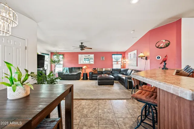 a view of a living room and dining room