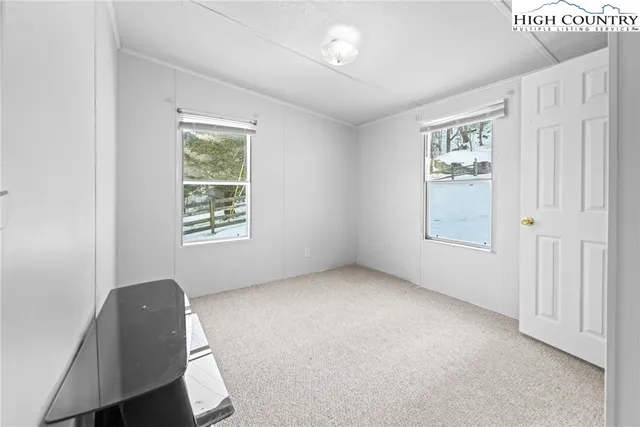 an empty room with windows