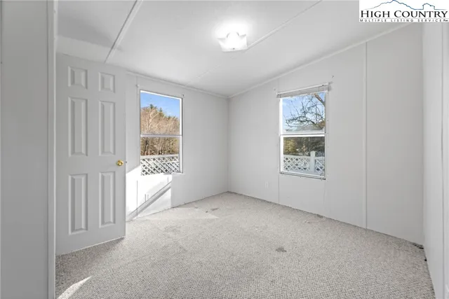 an empty room with windows