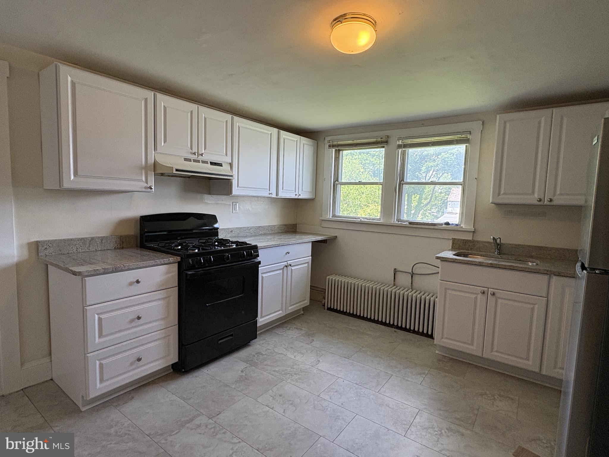 119 Maffitt Street, Unit 4 Elkton, MD 21921 - Photo 4 of 16 Updated Kitchen - New Cabinets & Granite Counters