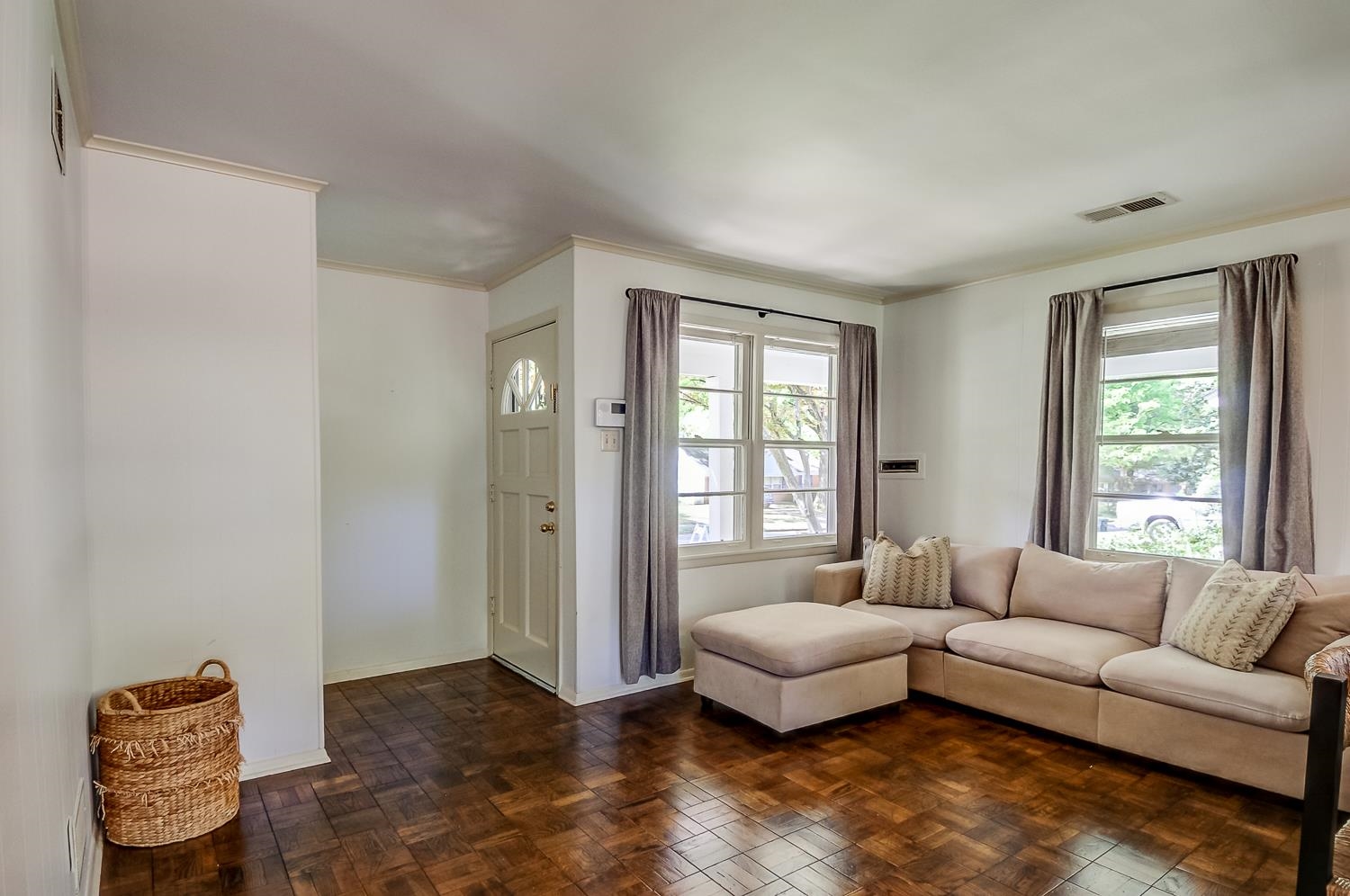 5056 Wingdale Road Memphis, TN 38117 - Photo 8 of 18 Living room with ornamental molding and parquet flooring