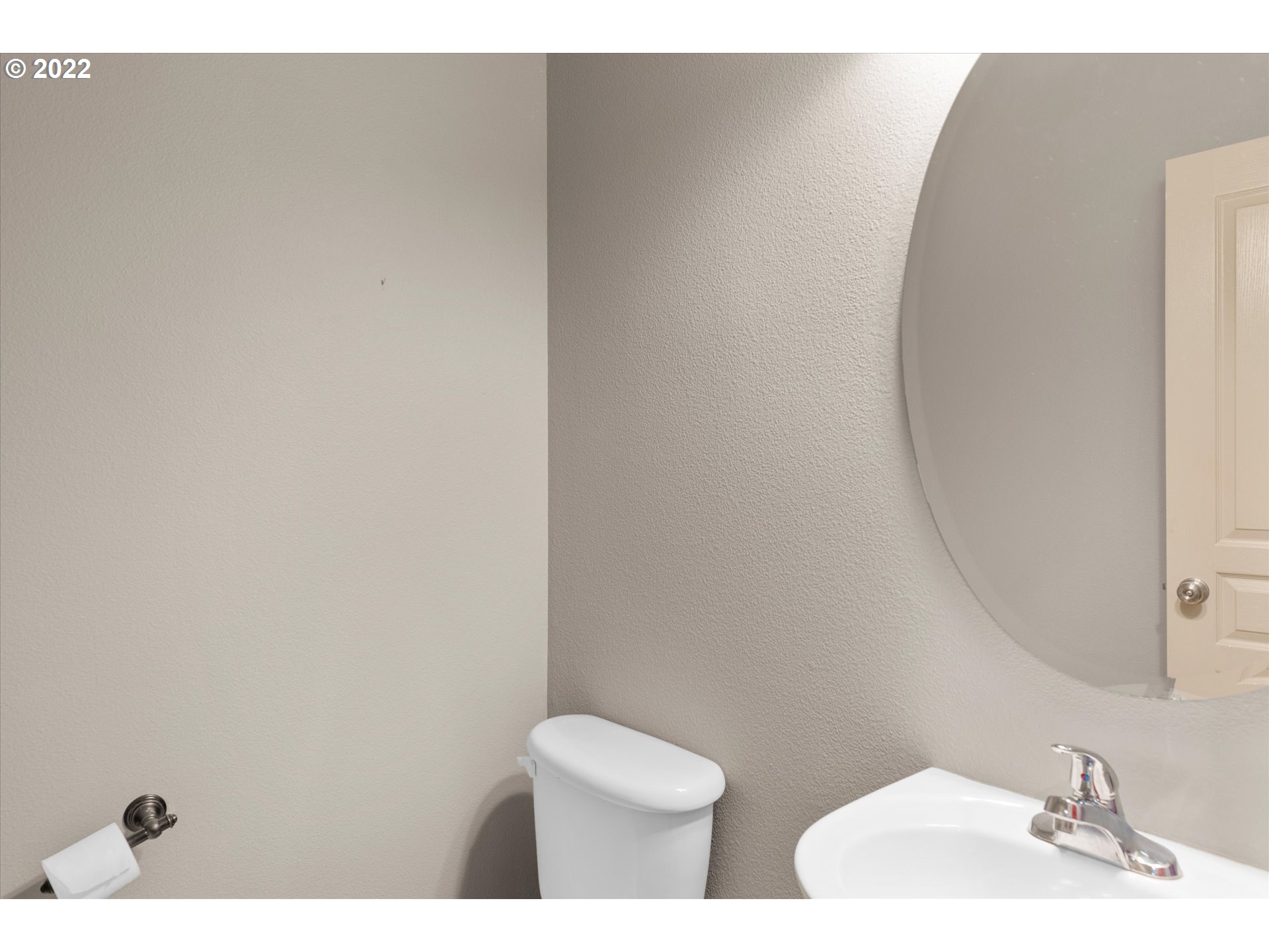 40310 Dubarko Road Sandy, OR 97055 - Photo 12 of 23 a bathroom with a toilet sink and mirror