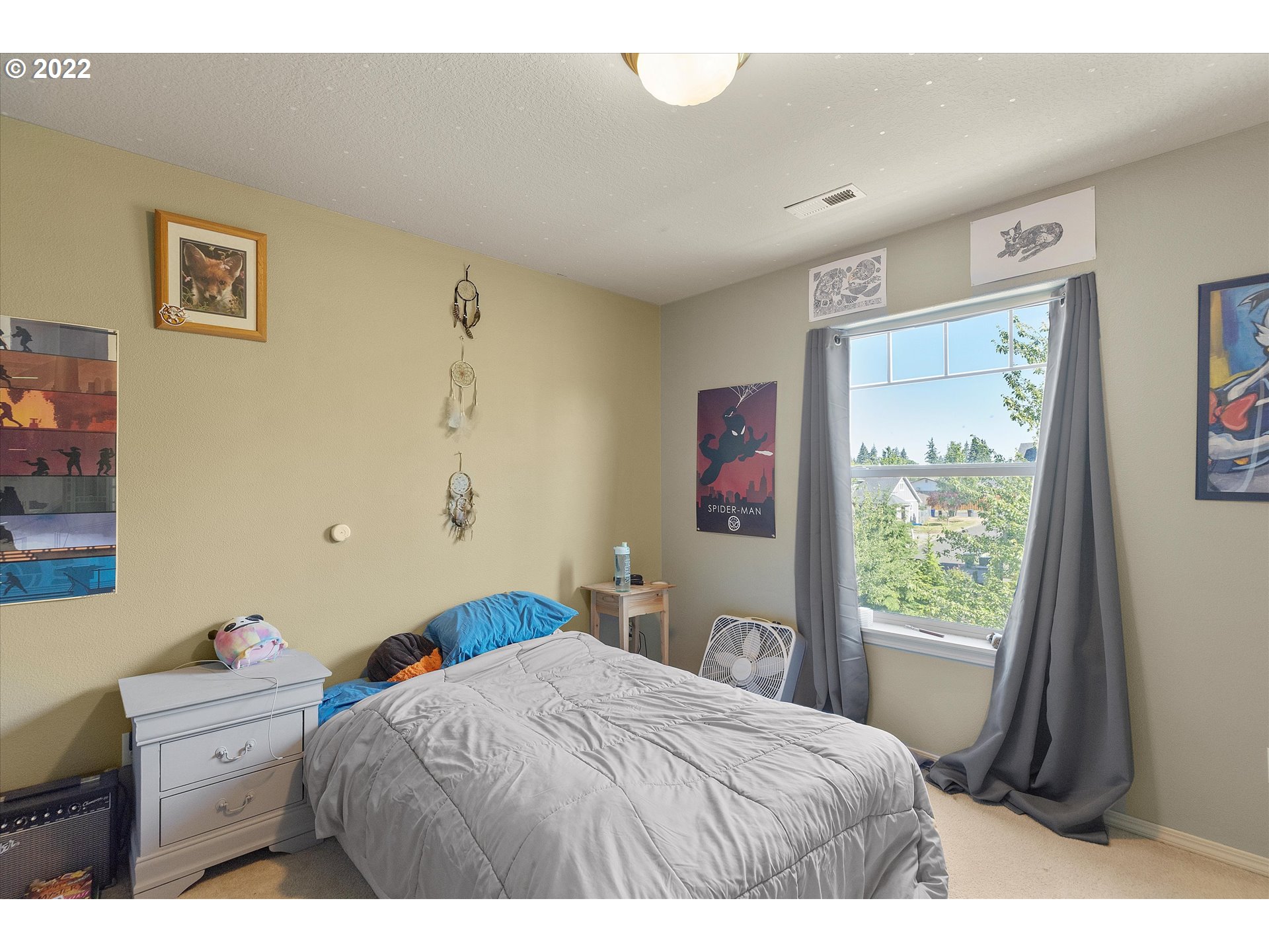 40310 Dubarko Road Sandy, OR 97055 - Photo 17 of 23 a bedroom with a bed and a window