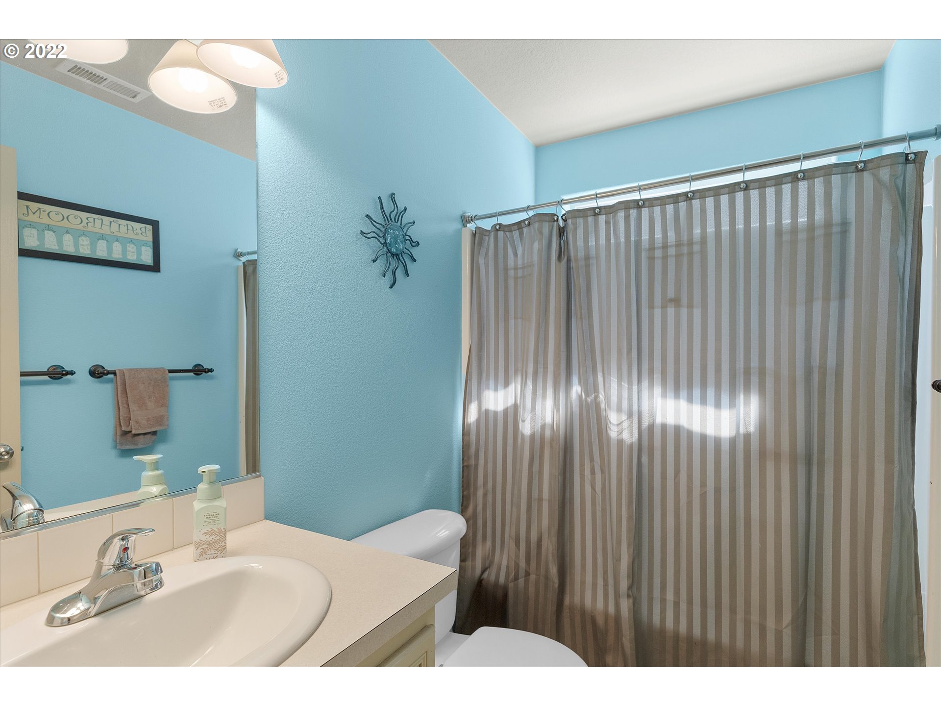 40310 Dubarko Road Sandy, OR 97055 - Photo 22 of 23 a bathroom with a sink and a mirror