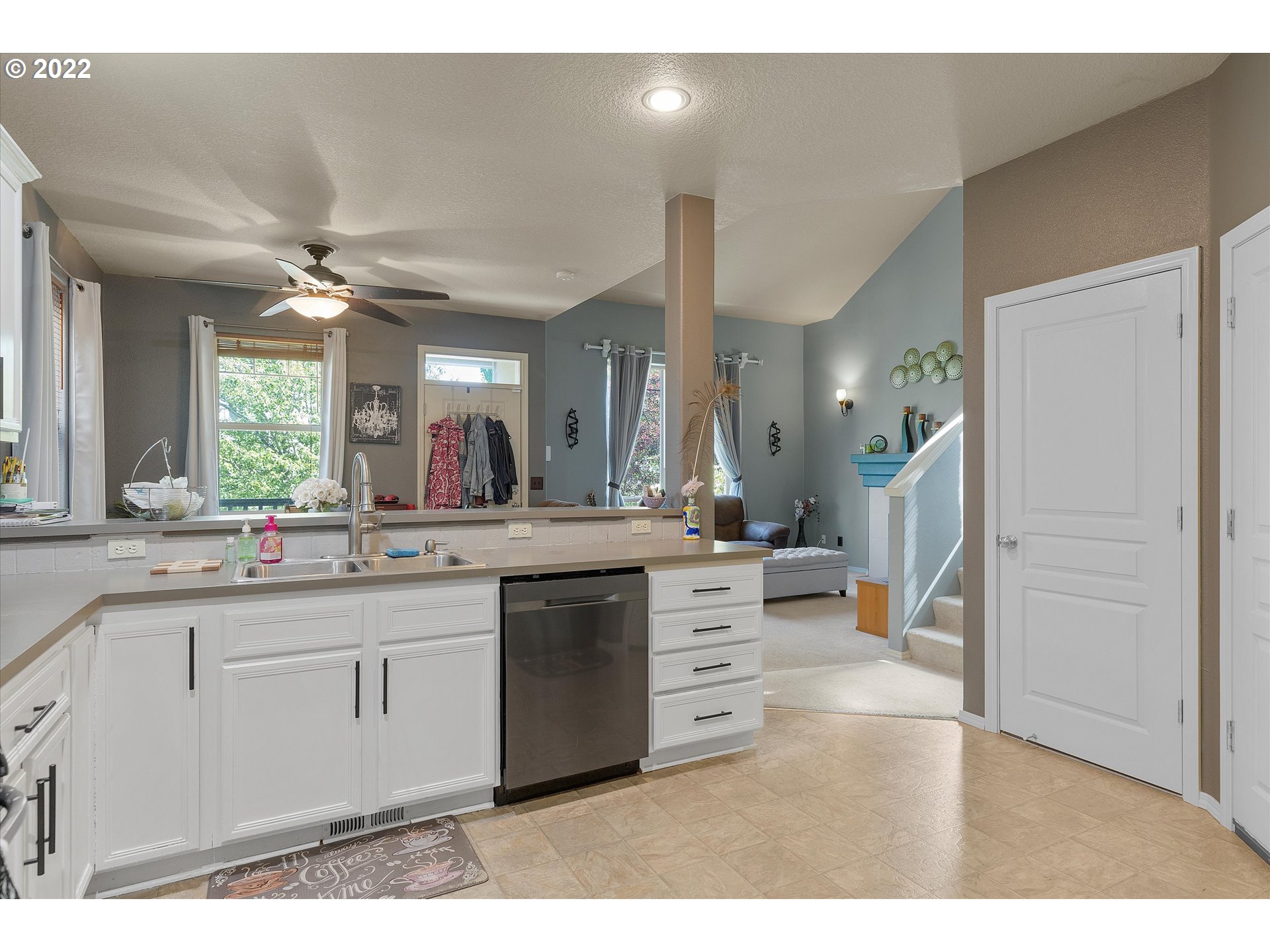 40310 Dubarko Road Sandy, OR 97055 - Photo 6 of 23 a large white kitchen with a sink and dishwasher