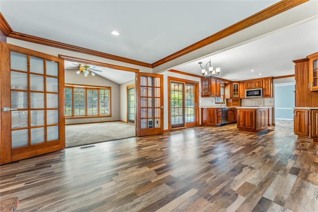 120 Timothy Road Gibsonia, PA 15044 - Photo 16 of 50 a view of an empty room with wooden floor and a window