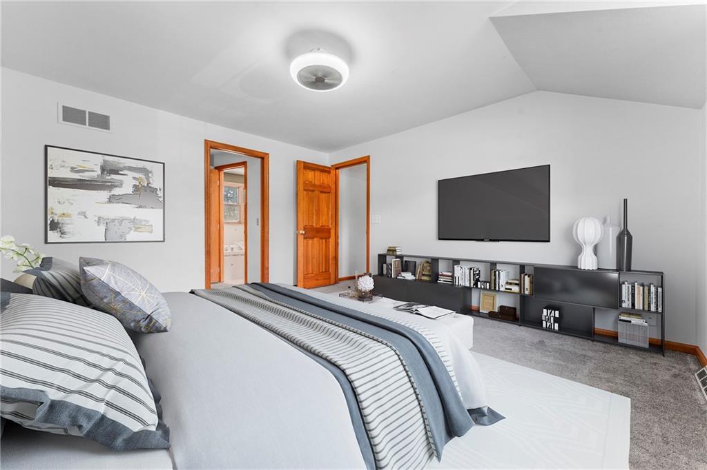 120 Timothy Road Gibsonia, PA 15044 - Photo 25 of 50 a bedroom with a bed and a flat tv screen on dresser