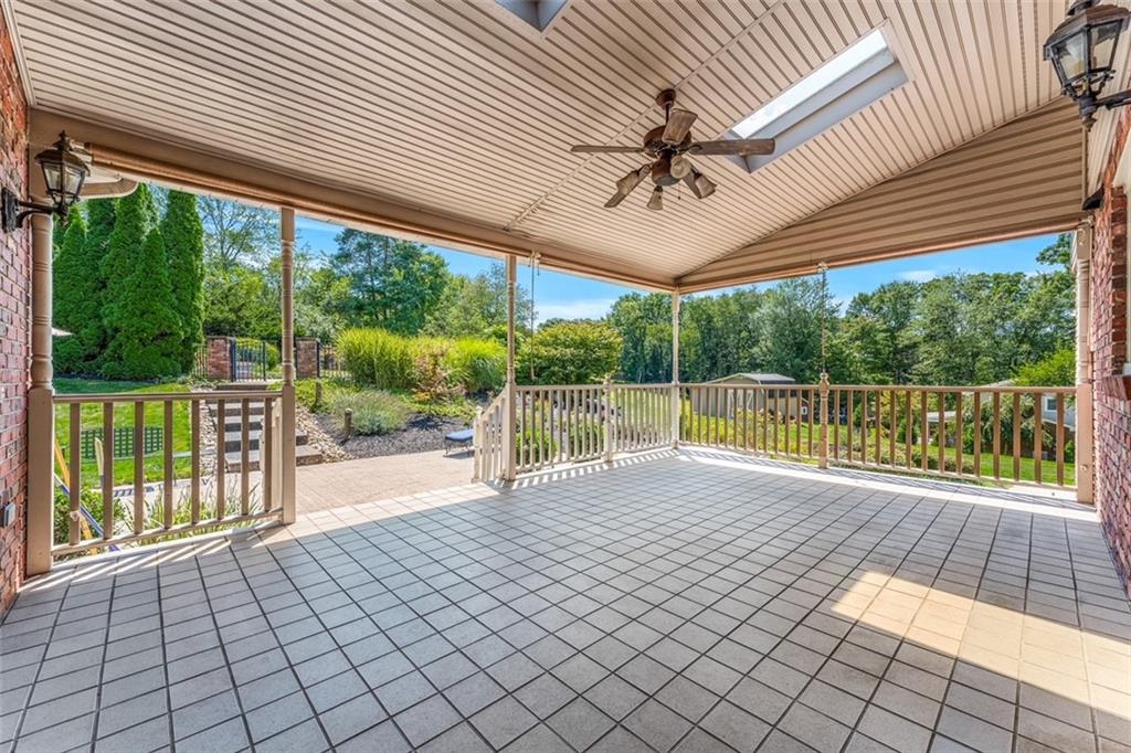 120 Timothy Road Gibsonia, PA 15044 - Photo 42 of 50 a view of a porch with wooden floor and fence