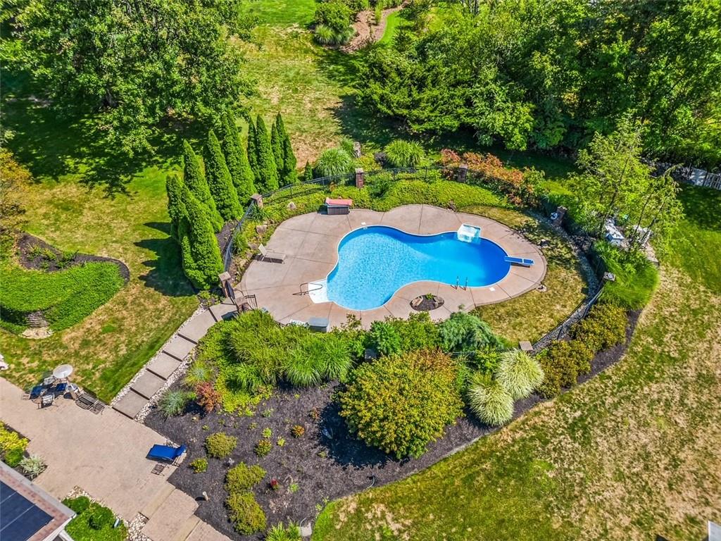 120 Timothy Road Gibsonia, PA 15044 - Photo 48 of 50 a view of a garden with a swimming pool