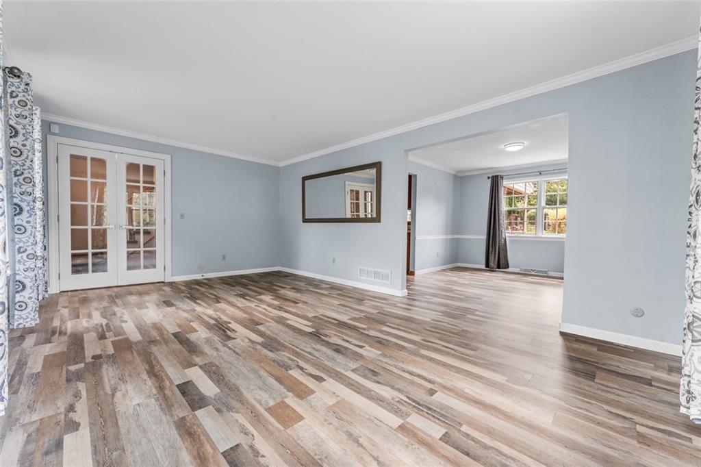 120 Timothy Road Gibsonia, PA 15044 - Photo 8 of 50 a view of empty room with window and wooden floor
