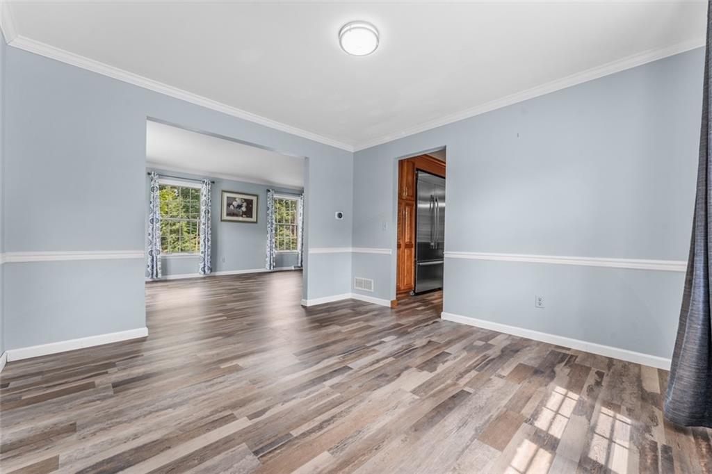 120 Timothy Road Gibsonia, PA 15044 - Photo 10 of 50 an empty room with wooden floor and windows