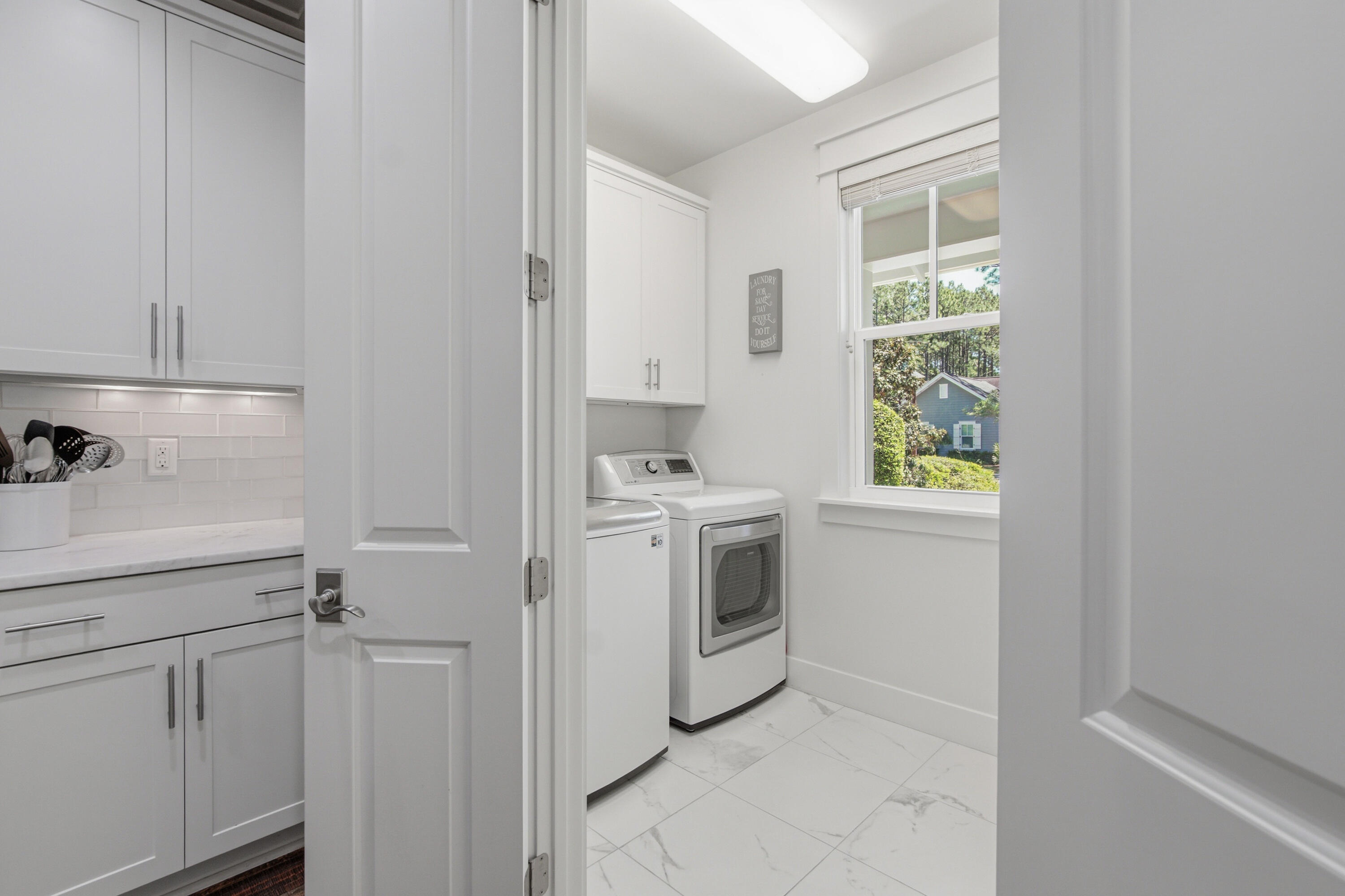 755 Breakers Street, Unit LOT 50 Inlet Beach, FL 32461 - Photo 11 of 61 a view of utility room and washer dryer