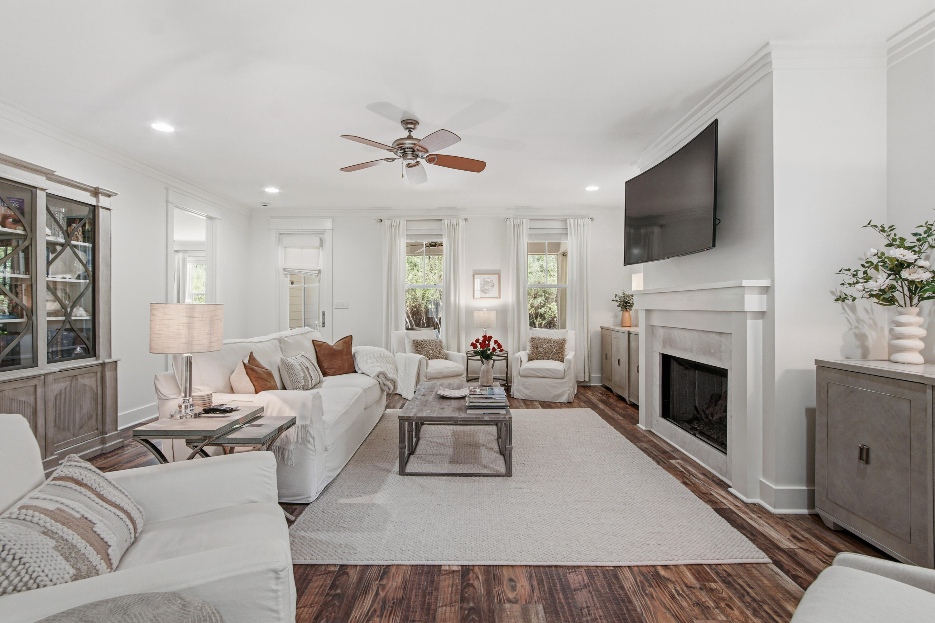 755 Breakers Street, Unit LOT 50 Inlet Beach, FL 32461 - Photo 16 of 61 a living room with furniture a fireplace and a flat screen tv