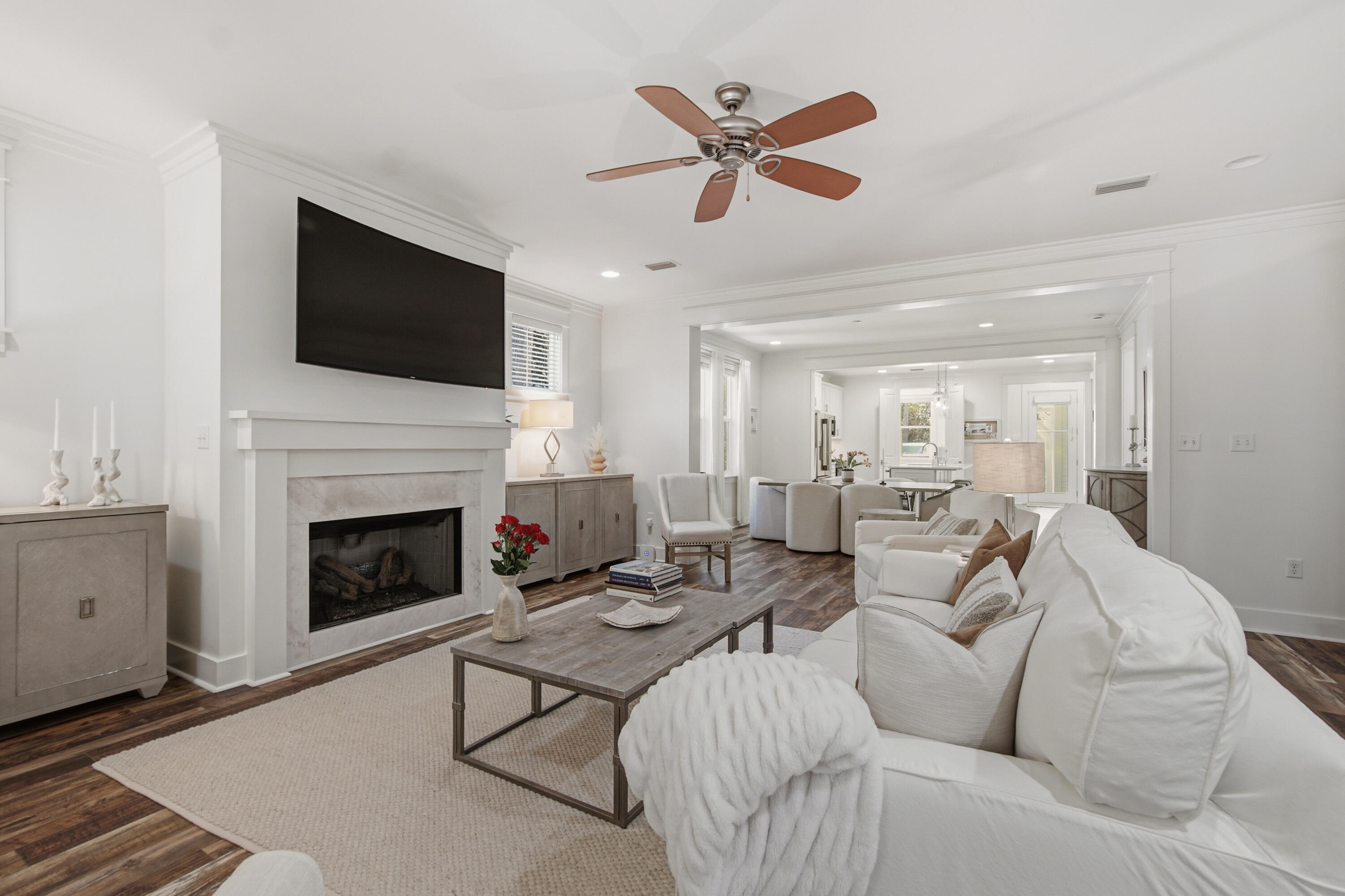 755 Breakers Street, Unit LOT 50 Inlet Beach, FL 32461 - Photo 18 of 61 a living room with furniture a fireplace and a flat screen tv